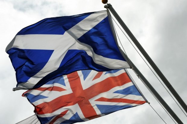 The Saltire, the flag of Scotland flies above the Union flag near the border between Scotland and England in August 2014 The Saltire, the flag of Scotland flies above the Union flag near the border between Scotland and England in August 2014