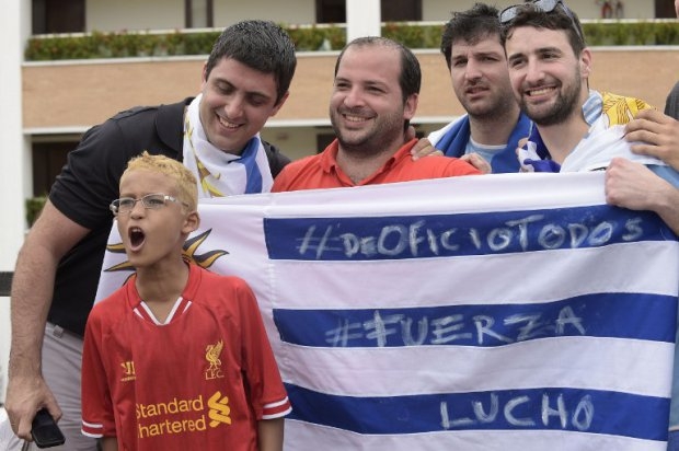 Uruguayan fans demonstrate in support of Suarez in front of the team hotel in Natal, June 26. Uruguayan fans demonstrate in support of Suarez in front of the team hotel in Natal, June 26.