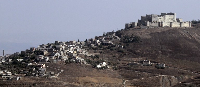 Syria's 12th-century Krak des Chevaliers castle and the adjacent village of al-Hosn Syria's 12th-century Krak des Chevaliers castle and the adjacent village of al-Hosn