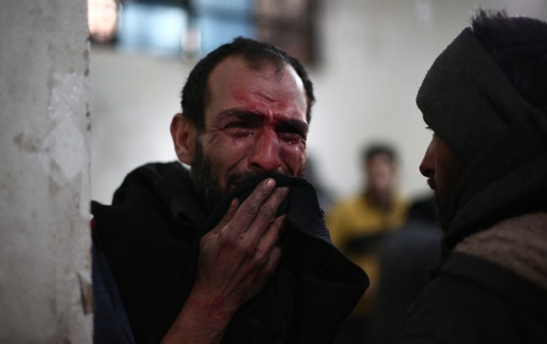 A Syrian man awaits treatment at a makeshift clinic in Douma, Syria on February 5, 2015 A Syrian man awaits treatment at a makeshift clinic in Douma, Syria on February 5, 2015