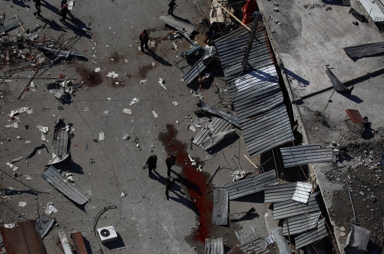 Blood and debris following air strikes by government forces in Douma, Syria on February 5, 2015 Blood and debris following air strikes by government forces in Douma, Syria on February 5, 2015