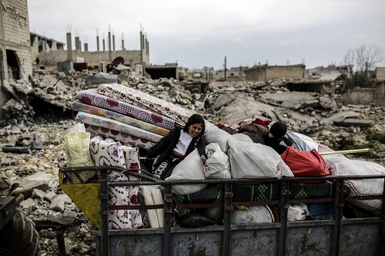 Kurdish Syrians returning home to Kobane on March 24, 2015 Kurdish Syrians returning home to Kobane on March 24, 2015