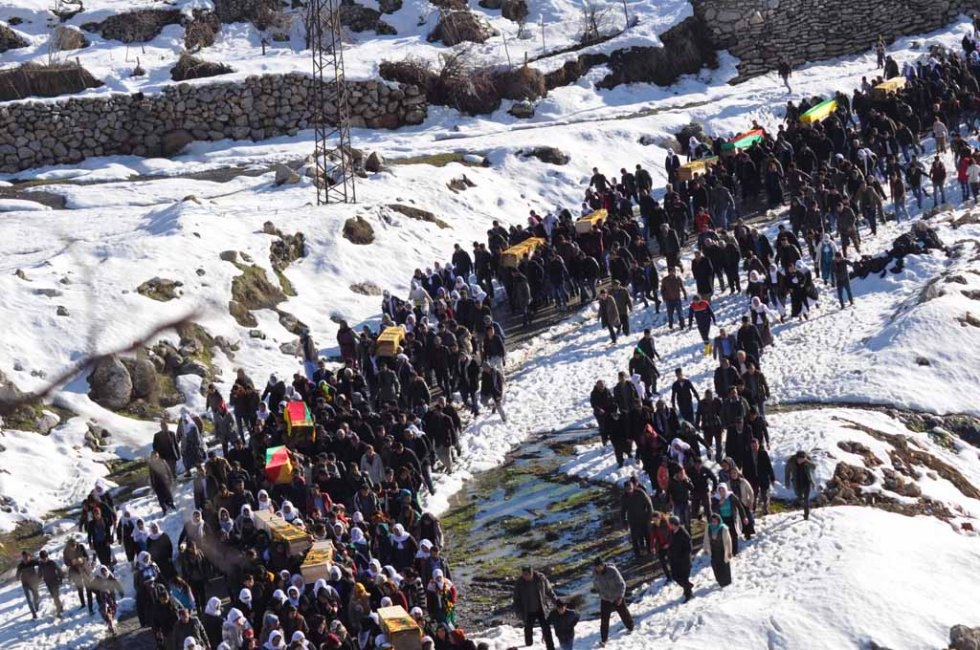 A funeral procession on January 12 for those killed during curfews in Turkey's restive southeast. A funeral procession on January 12 for those killed during curfews in Turkey's restive southeast.