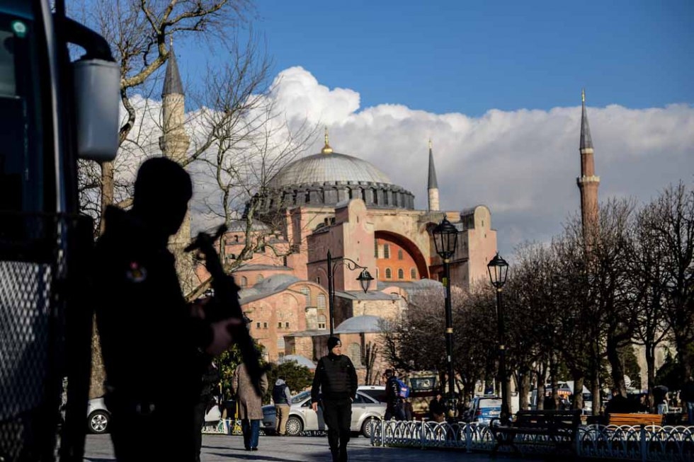 A Turkish riot police officer stands guard two days after the Istanbul attack. A Turkish riot police officer stands guard two days after the Istanbul attack.
