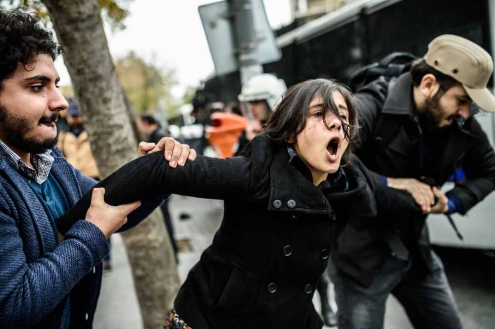 Plain clothes police detain a student at Istanbul University in early November, after the ruling party regained its parliamentary majority. Plain clothes police detain a student at Istanbul University in early November, after the ruling party regained its parliamentary majority.
