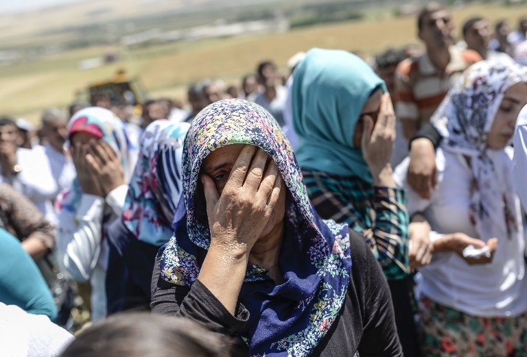 Relatives mourn a victim of the deadly Diyarbakir blasts in early June. Relatives mourn a victim of the deadly Diyarbakir blasts in early June.
