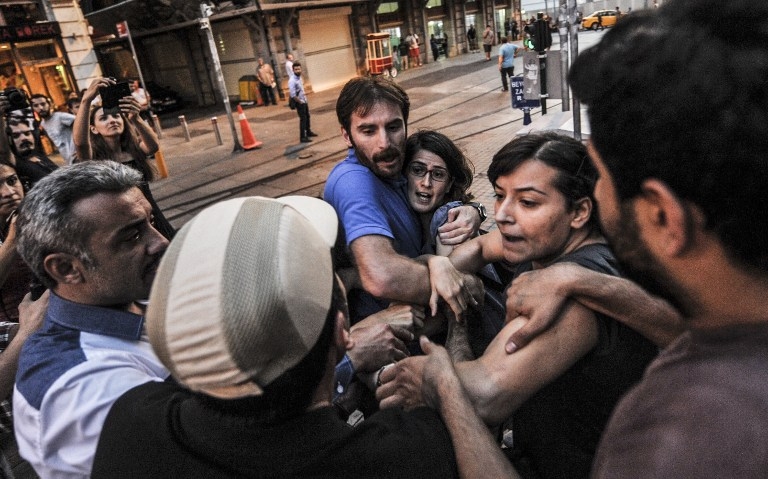 Turkish police in a stand-off with leftist protestors demonstrating against new Turkish President Recep Tayyip Erdogan in Istanbul on August 28, 2014 Turkish police in a stand-off with leftist protestors demonstrating against new Turkish President Recep Tayyip Erdogan in Istanbul on August 28, 2014