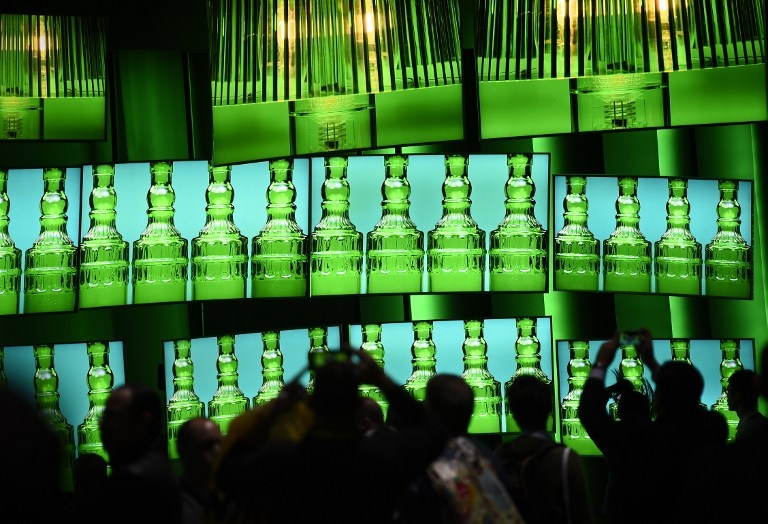 Attendees photograph 4K TVs from Samsung at CES on January 8, 2015 Attendees photograph 4K TVs from Samsung at CES on January 8, 2015