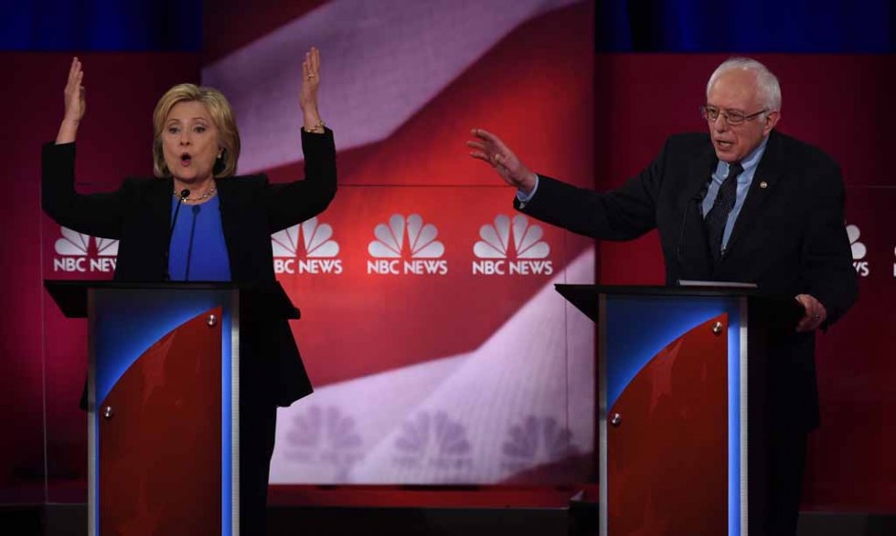 Hillary Clinton and Bernie Sanders at a South Carolina debate. January 17, 2016. Hillary Clinton and Bernie Sanders at a South Carolina debate. January 17, 2016.