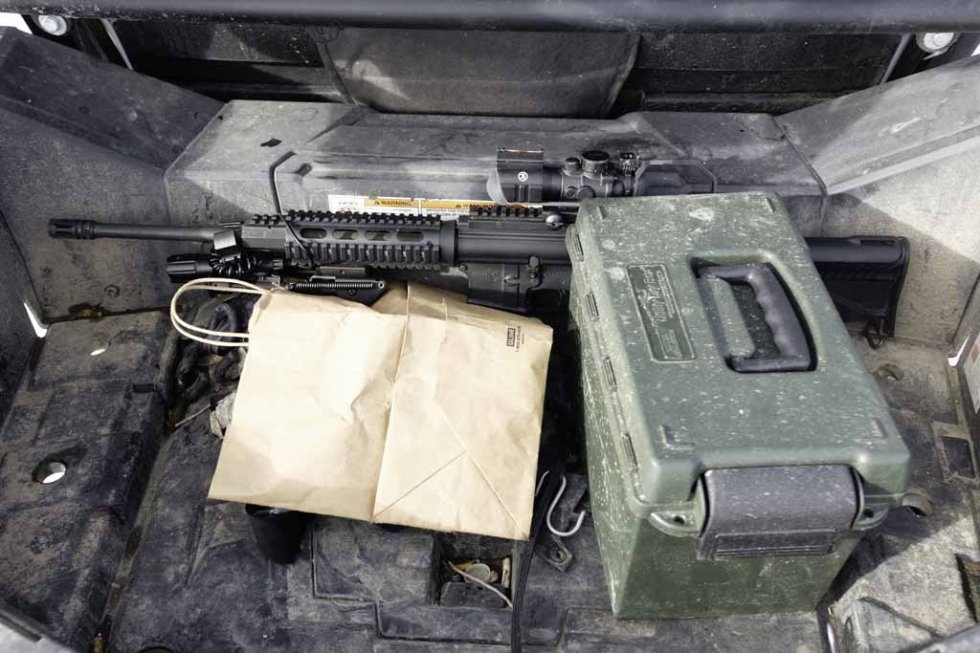 Firearms and ammunition in the back of an occupier's truck. January 15, 2016. Firearms and ammunition in the back of an occupier's truck. January 15, 2016.