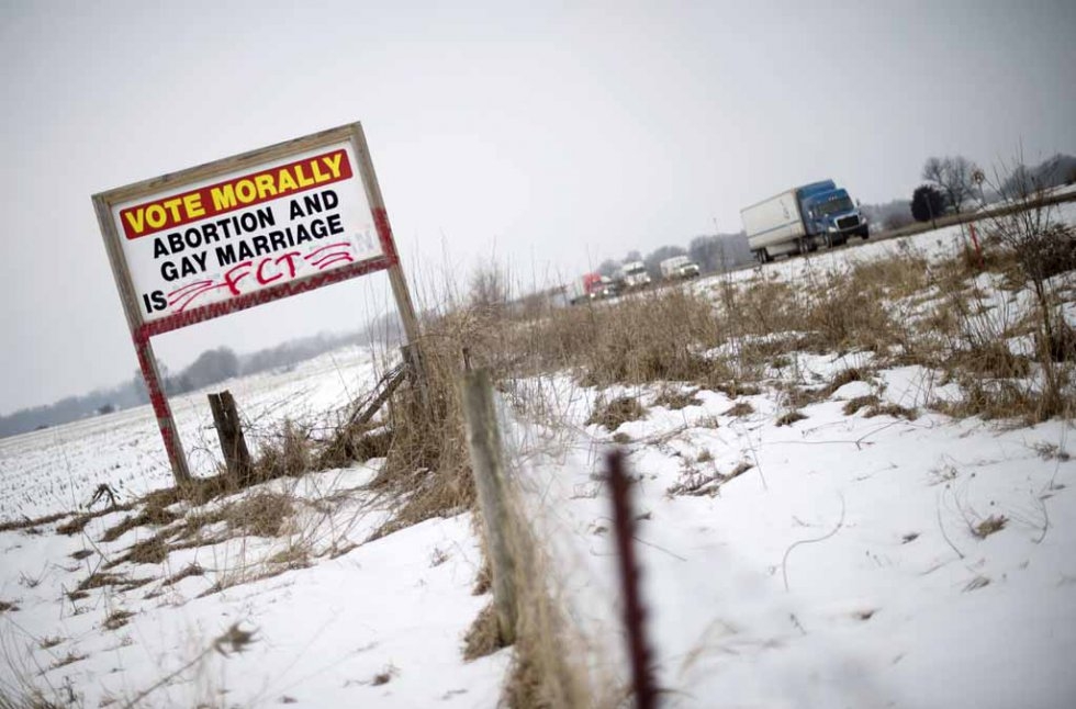 A sign posted on an Iowa farm. A sign posted on an Iowa farm.