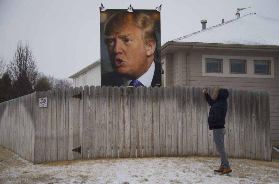 A poster of Donald Trump in an Iowa backyard. A poster of Donald Trump in an Iowa backyard.