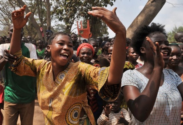 Women celebrate the president's visit at a camp for the displaced in Bangui on February 1, 2014 Women celebrate the president's visit at a camp for the displaced in Bangui on February 1, 2014
