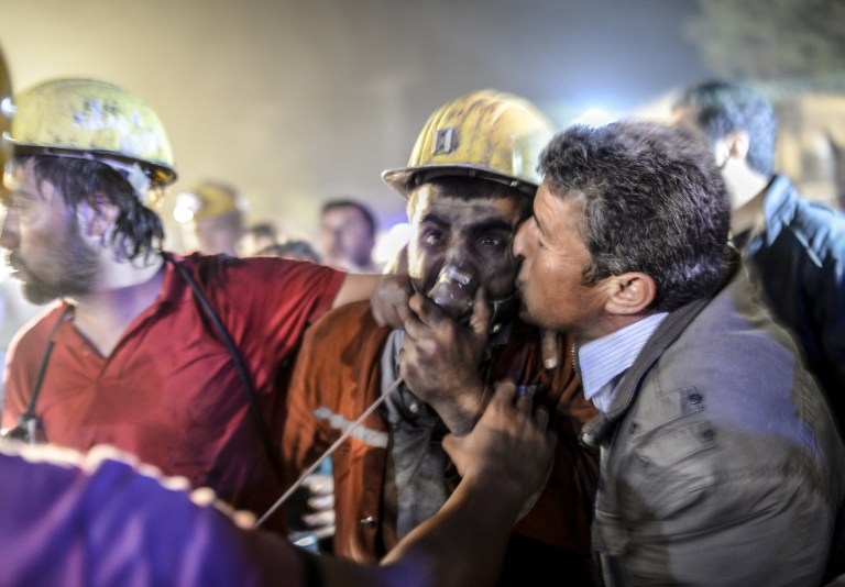 A miner caught in the May 13, 2014 blast in Soma, western Turkey, is reunited with his father A miner caught in the May 13, 2014 blast in Soma, western Turkey, is reunited with his father