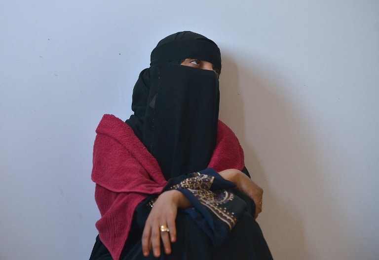 A Yemeni woman sits in her quarters at a UNHCR facility at Obock in Djibouti on April 13, 2015 A Yemeni woman sits in her quarters at a UNHCR facility at Obock in Djibouti on April 13, 2015