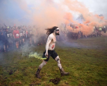 Competitors prepare to start the 'Tough Guy' adventure race near Wolverhampton, central England, on January 29, 2017.  The Tough Guy event, which is being held for the final time in its 30th year, challenges thousands of competitors to run a gruelling cou