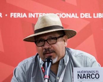 This file photo taken on November 27, 2016 shows Mexican journalist Javier Valdez speaking during the presentation of his book Huerfanos del Narco  in the framework of the International Book Fair in Guadalajara, Mexico. 