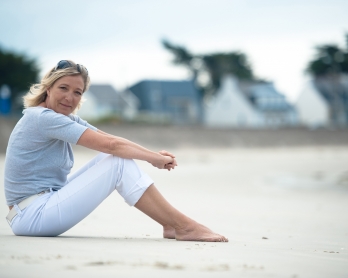 This file photo taken on July 28, 2010 shows French far right party, the National Front's (FN) vice-president Marine Le Pen posing on the beach in La Trinite-sur-Mer, northern France.