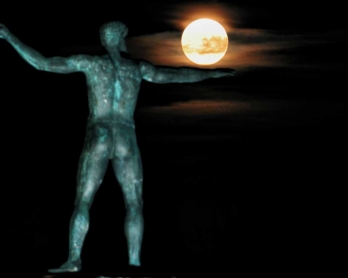 The 'Supermoon' rises above the statue of the ancient Greek god Poseidon in Ancient Corinth on November 14, 2016. 