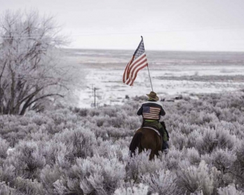 Occupier Duane Ehmer rides his horse Hellboy on January 7, 2016. (AFP/Rob Kerr)
